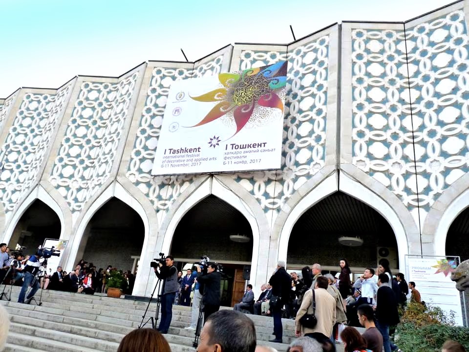 The façade of the festival building in Tashkent with the first edition’s banner and the crowd on the steps