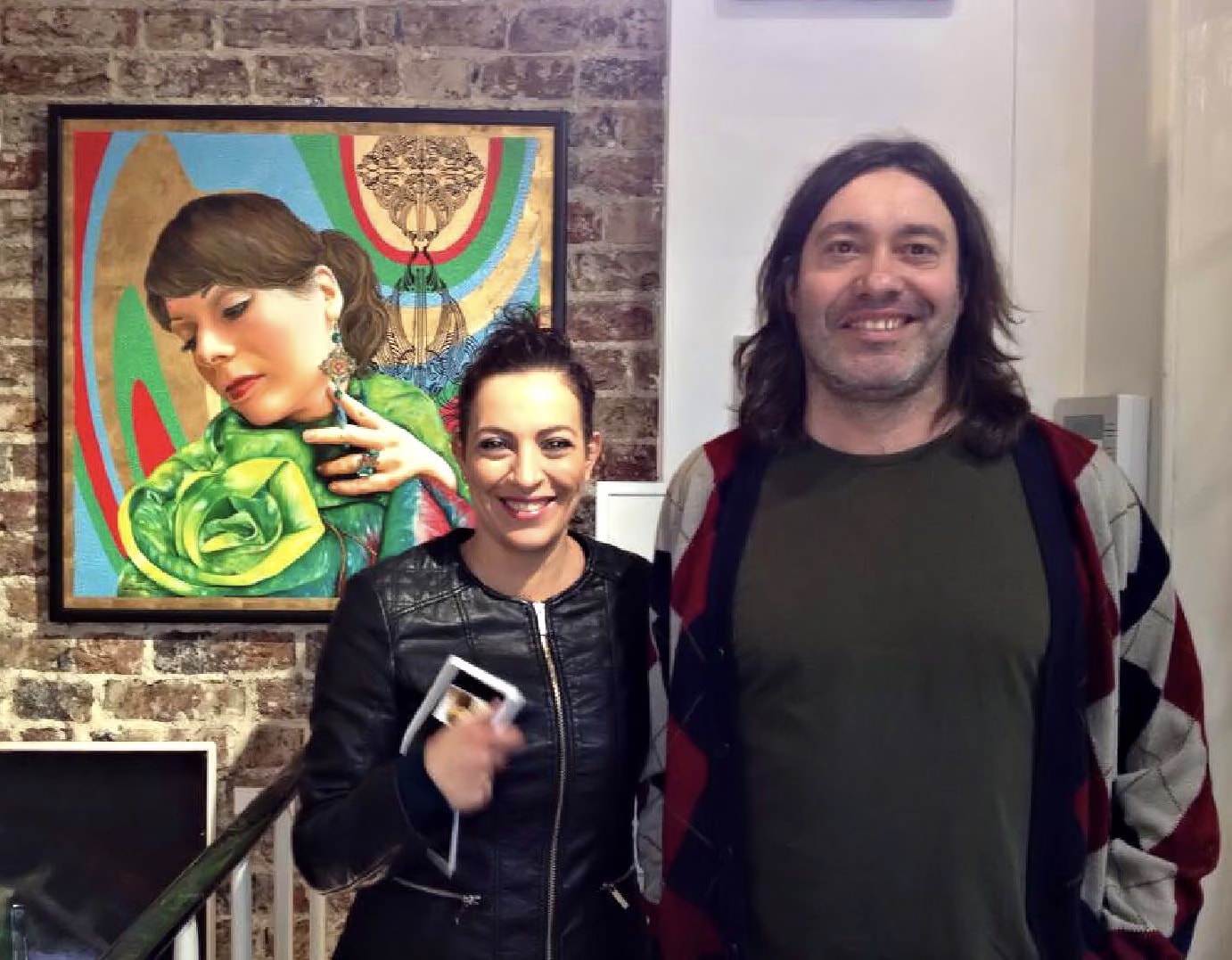 Two smiling visitors in front of Morena at La Galleria Pall Mall