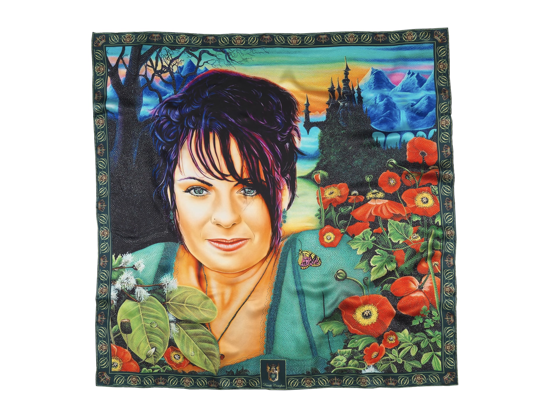 Foulard di seta Rosita steso, con il ritratto dell’opera fra castello, montagne e papaveri
